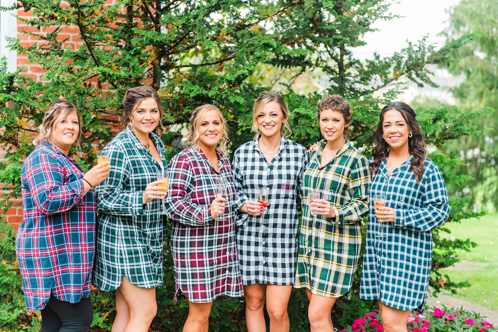 Bride and bridesmaids in matching flannels